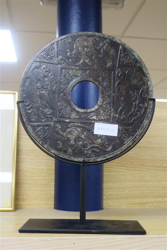 A large Chinese stone bi disc with stand, Dia.30cm not including stand